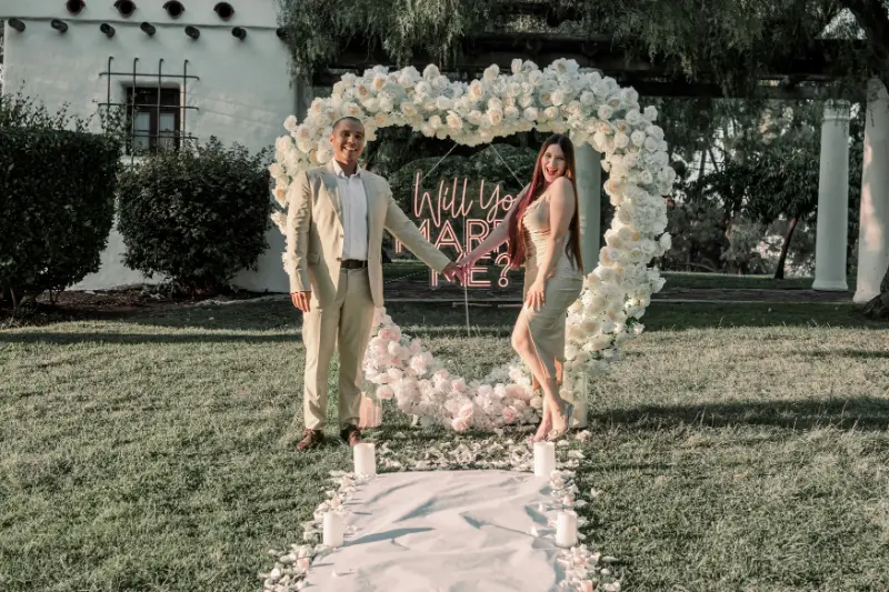 Garden engagement party with string lights